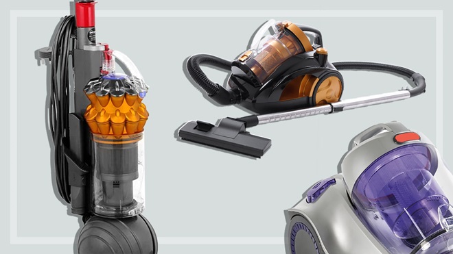 three barrel and upright vacuum cleaners on a grey background